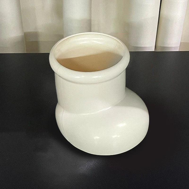 Artistic Red Boots Desk Storage with Christmas Decorations